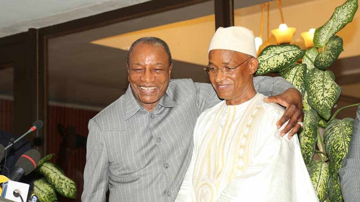 Alpha Condé, président de la Guinée, et Cellou Daléin Diallo, chef de file de l'opposition guinéenne. 