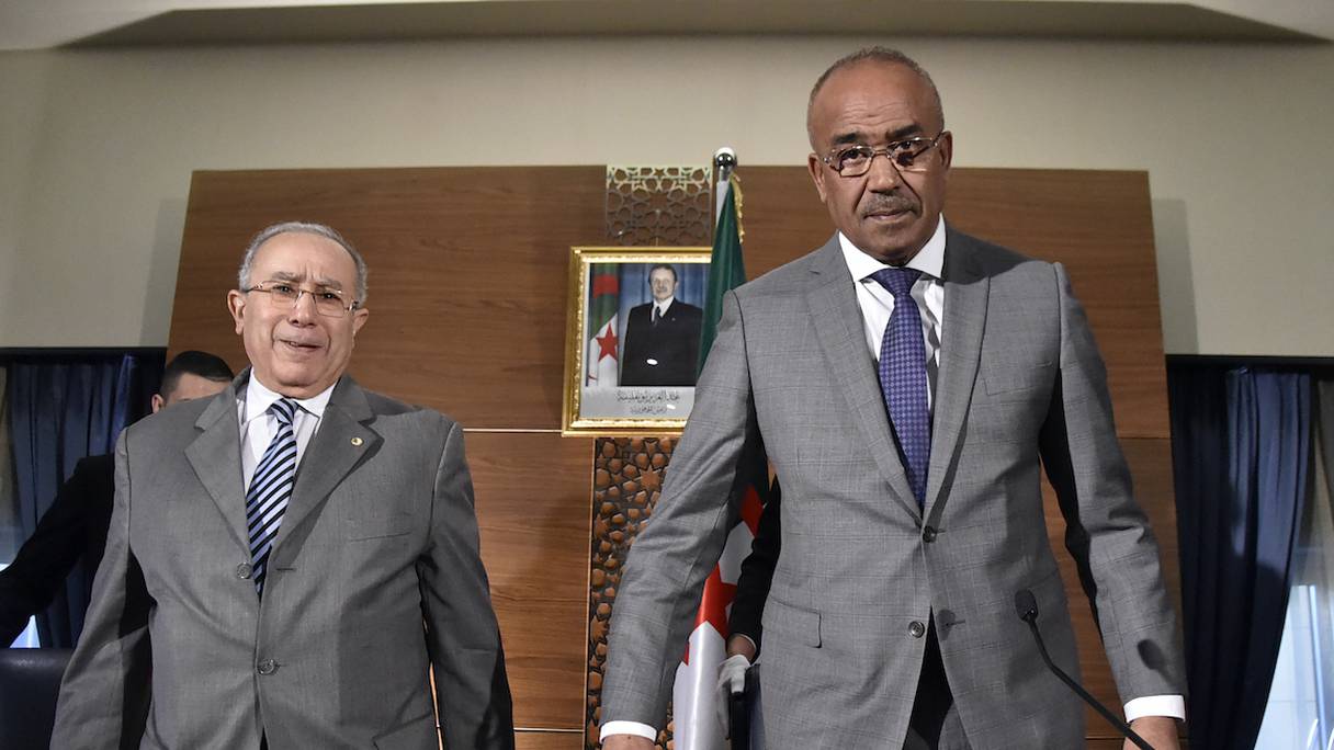 Noureddine Bedoui, alors nommé Premier ministre et Ramtane Lamamra, ministre des Affaires étrangères. 