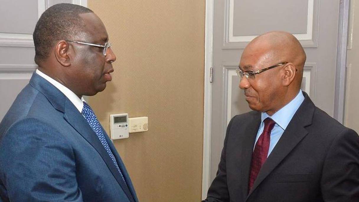Hadjibou Soumaré, président démissionnaire de la Commission avec Macky Sall, président du Sénégal. 