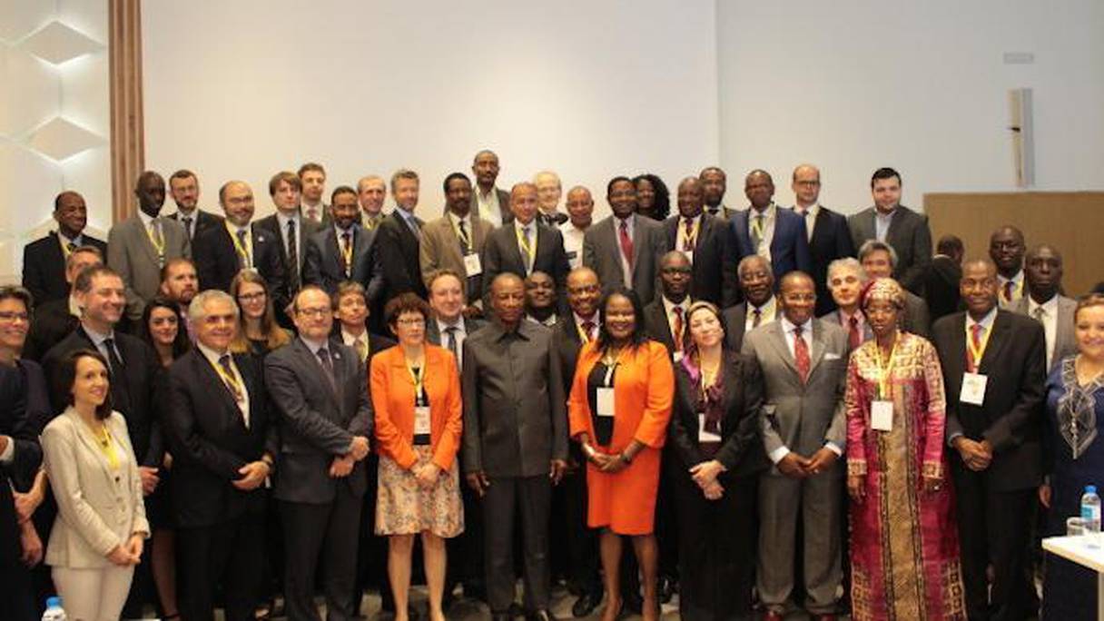 Le Conseil  d'administration de l'IAER avec le président guinéen Alpha Condé. 