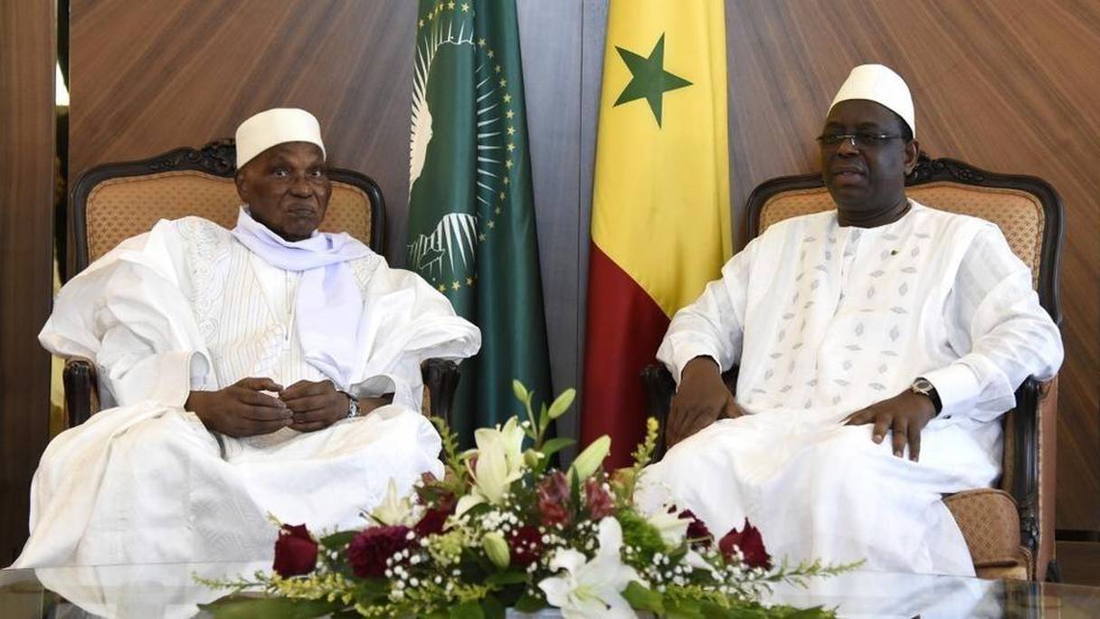 Les présidents Abdoulaye Wade et Macky Sall. 