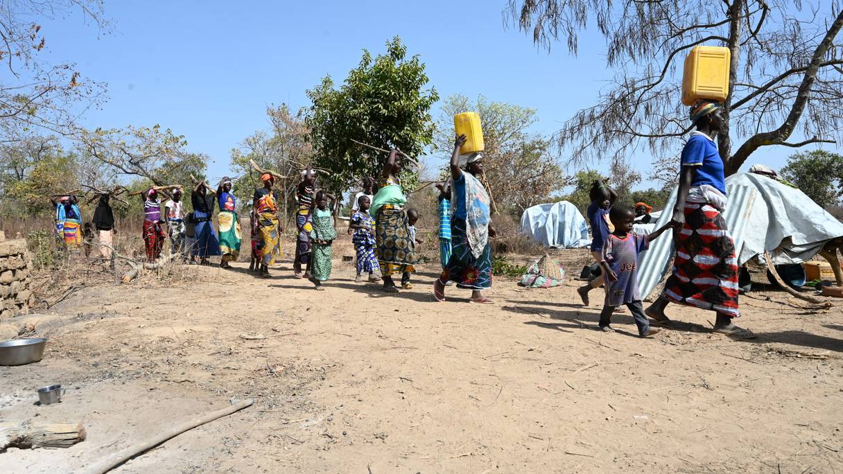 Des réfugiés du Burkina Faso sont vus dans un refuge à Tougbo le 22 janvier 2022. Des milliers de personnes qui ont fui vers la Côte d'Ivoire à la suite d'attaques djihadistes au Burkina Faso vivent dans les limbes.