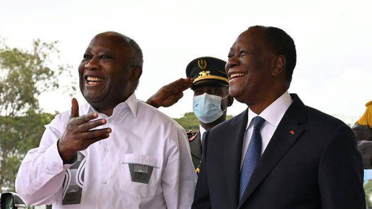 L'ex-président Laurent Gbagbo et son successeur Alassane Ouattara, lors de leurs retrouvailles du 27 juillet 2021. 