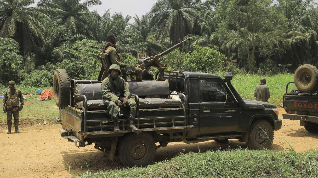 Un convoi de soldats des FARDC (Forces Armées de la République Démocratique du Congo) dans le village Idohu sur l'axe Beni-Komanda, le 19 mars 2022.