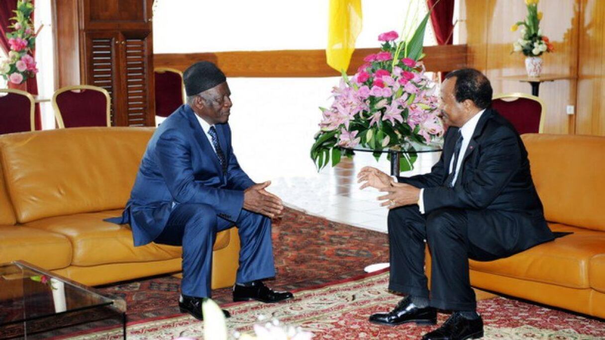 L'opposant John Fru Ndi, président du SDF, et Paul Biya, Président du Cameroun.