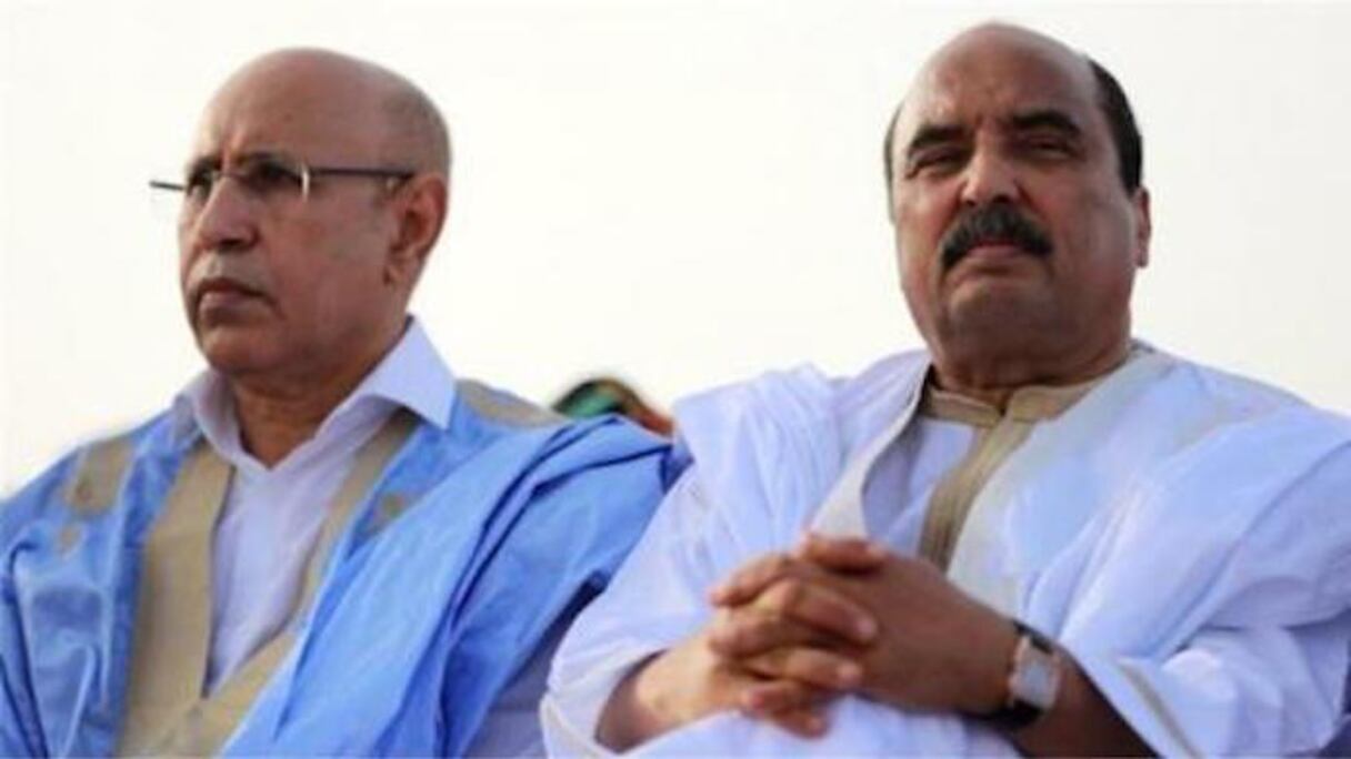 L'actuel président Mohamed Cheikh el Ghazouani (à gauche) et l'ancien président Mohamed ould Abdel Aziz (à droite).