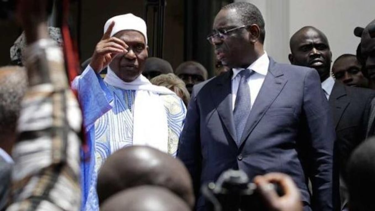 Macky Sall, président du Sénégal (droite) et Abdoulaye Wade (ancien président).