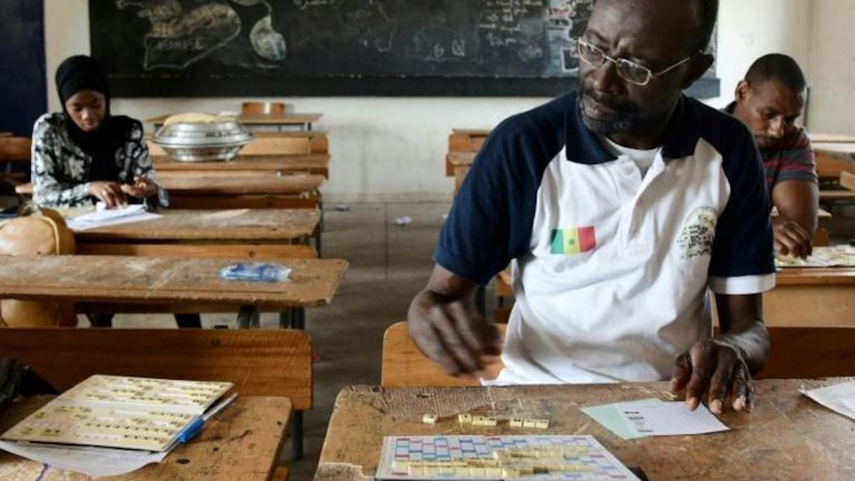 Les amateurs de Scrabble sont déjà devant leurs chevalets et leur plateau.