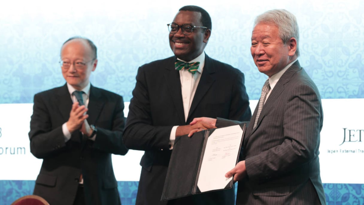De g. à dr.: Masato Kanda, vice-ministre des Finances pour les affaires internationales du Japon, Akinwumi Adesina, président de la Banque africaine de développement, et Akihiko Tanaka, président de l’Agence japonaise de coopération internationale.