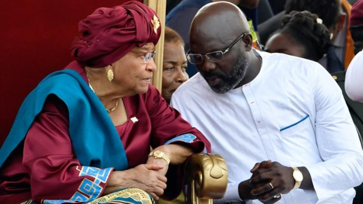 George Weah, président du Libéria, avec l'ex-présidente Sirleaf Johnson.