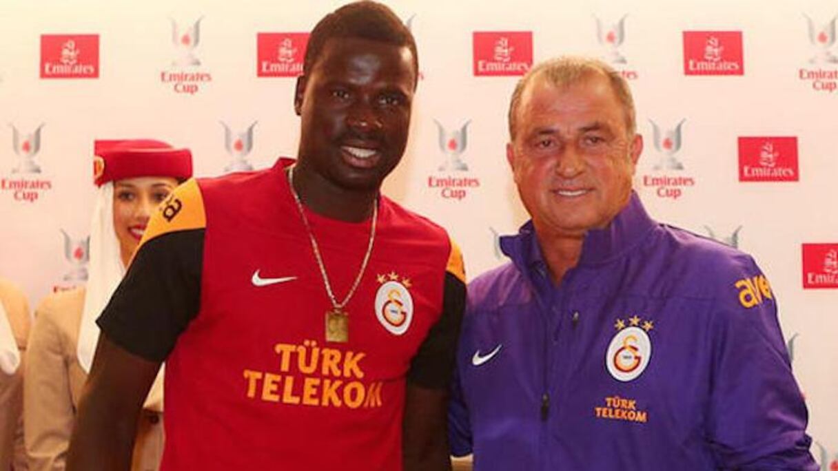 Emmanuel Eboué, ancien international ivoirien, et Fatih Terim, entraineur du club turc de Galasataray.