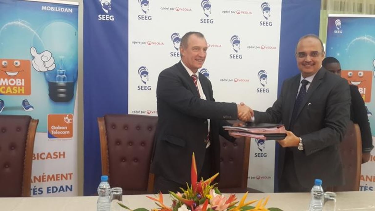 Abderrahim Koumaa (à droite), directeur général de Gabon Télecom, et Jean Paul Camus, directeur général de la Société d’énergie et d’eau du Gabon (SEEG).